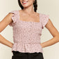 Floral print ruffled top